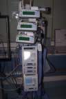 Stack of IV's and drug pumps. (437kb)